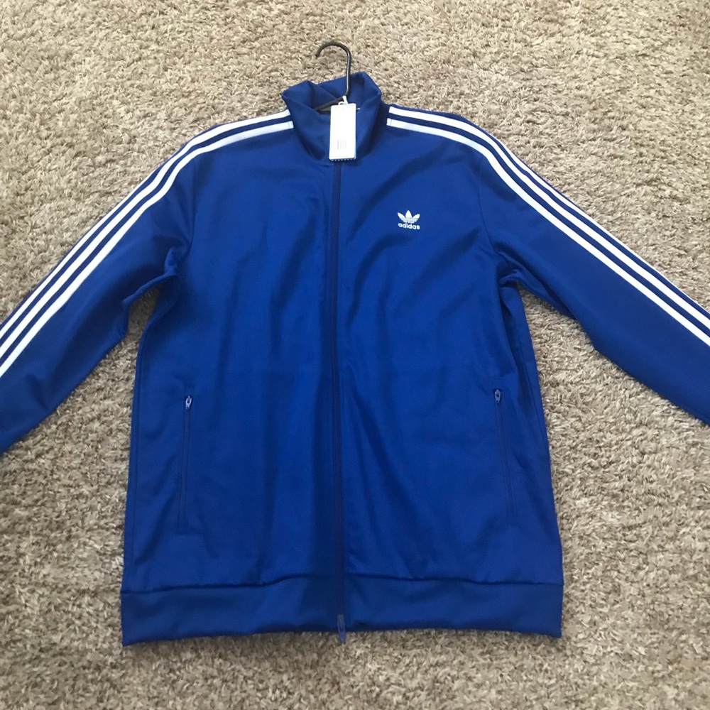 Adidas men track suit